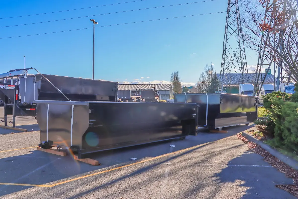 Roll-off dumpster ready for waste disposal at job site for Residential Dumpster Rental in Trinity